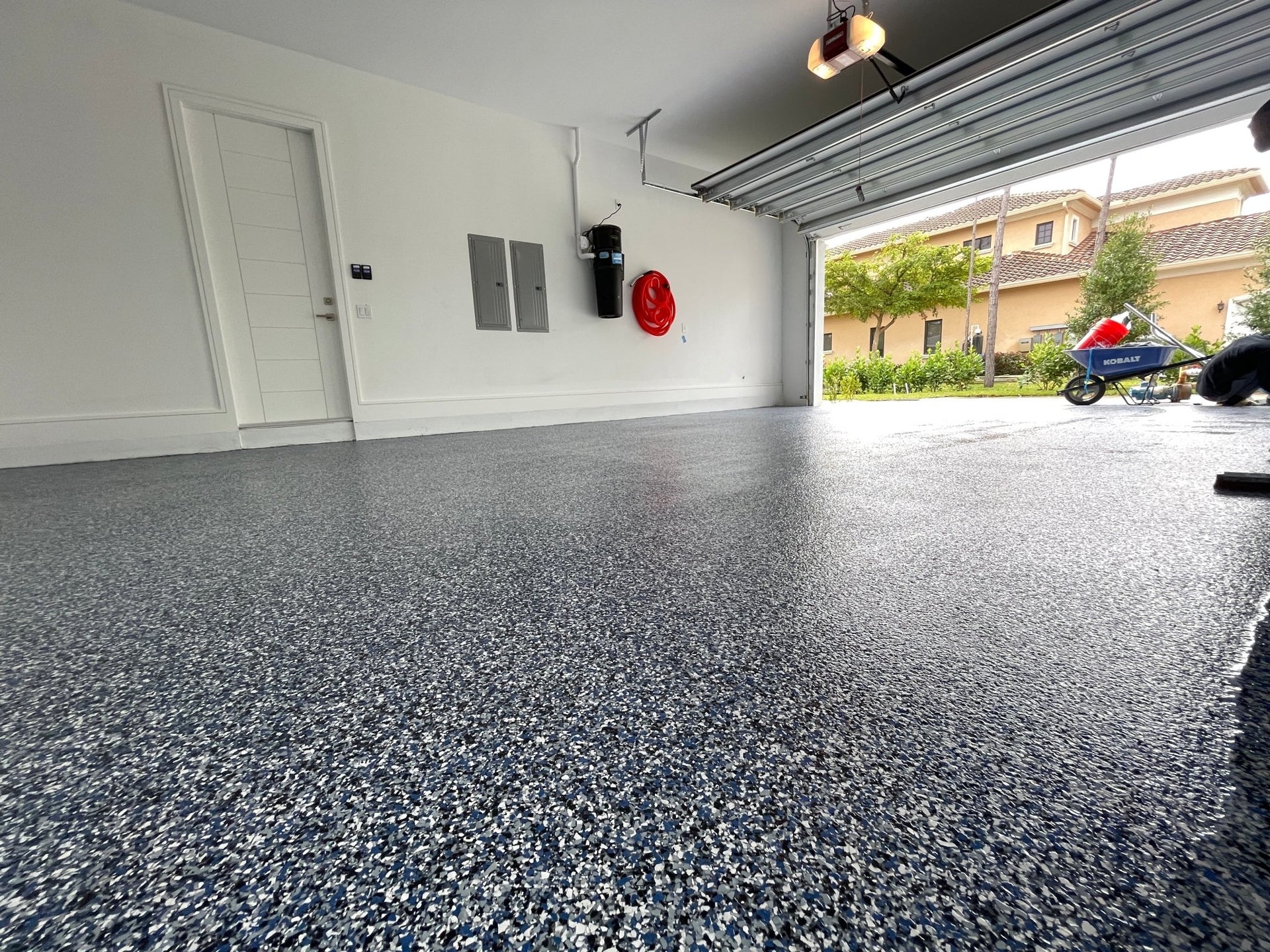 Professional epoxy garage flooring with decorative flakes